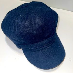 Women’s Navy Newsboy Hat with Front Sash & Button Accents.